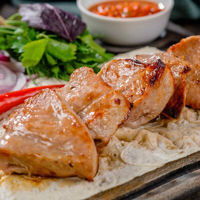 Шашлык из cвинoй шейки в Шашлык Хаус Grill Premium Combo по цене 810 ₽