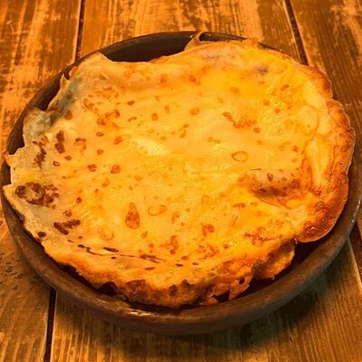 Блины, запечённые с сыром, яйцом и курицей в Billy McDaniel по цене 280 ₽