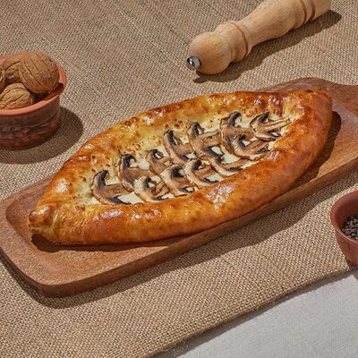 Хачапури лодочка с грибами и трюфельным маслом в Dostaевский по цене 631 ₽