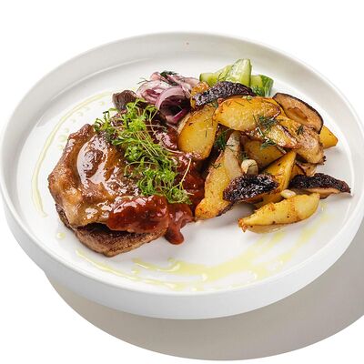 Стейк из свиной шеи в Песто Тесто по цене 790 ₽