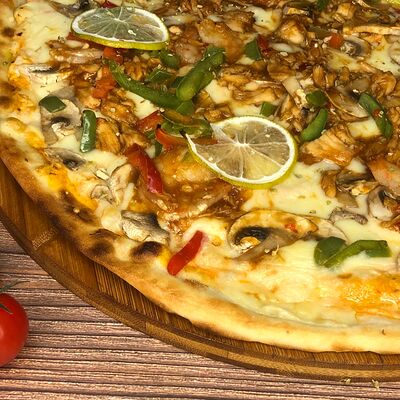 Пицца Вкусная в Pizza House по цене 1350 ₽