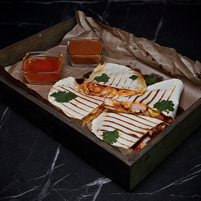 Кесадилья в Red Rocket Bar по цене 670 ₽