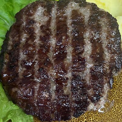 Котлета говяжьяв Гриль бар Онар по цене 210 ₽