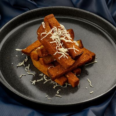 Гренки в Роллинка по цене 330 ₽