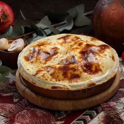 Тапака из филе курицы в Мангал хаус по цене 999 ₽