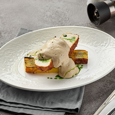 Картофельный гратен с колбасками и копченой сметанойв Lava по цене 630 ₽