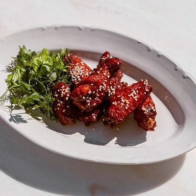 Куриные крылья в Brasserie Lambic по цене 750 ₽