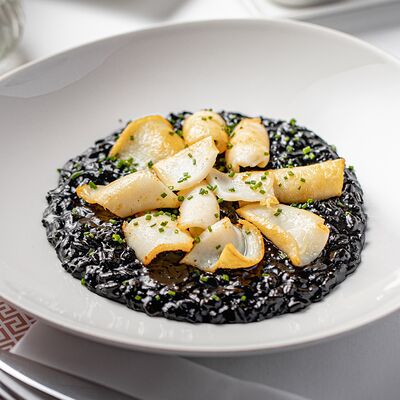 Ризотто с чернилами каракатицы в Romano по цене 1500 ₽