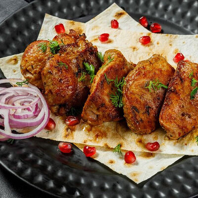 Шашлык из бедра индейки в Мангал холл по цене 1320 ₽