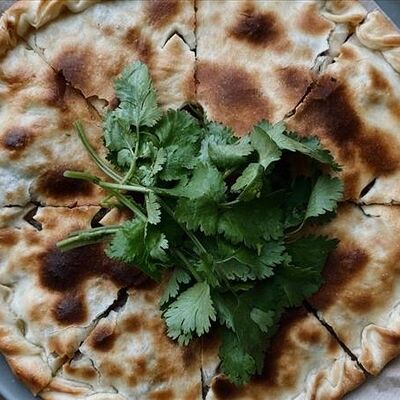 Осетинский пирог со свининой и говядиной в Shamparen по цене 750 ₽