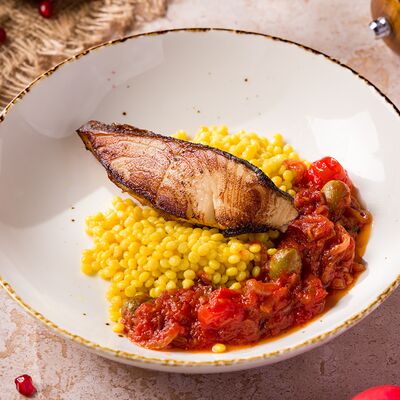 Треска с птитимом и сальсой из томатов и оливокв Чакапули по цене 1590 ₽