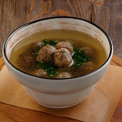 Бульон с фрикадельками в У Ханумы по цене 320 ₽