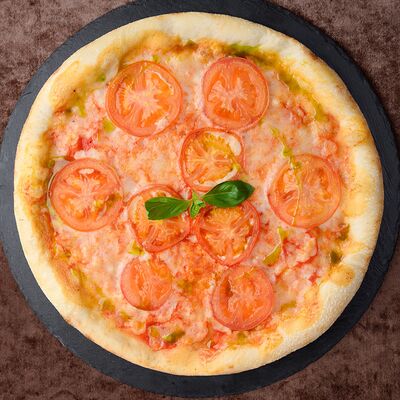 Пицца Маргарита в Chento по цене 750 ₽