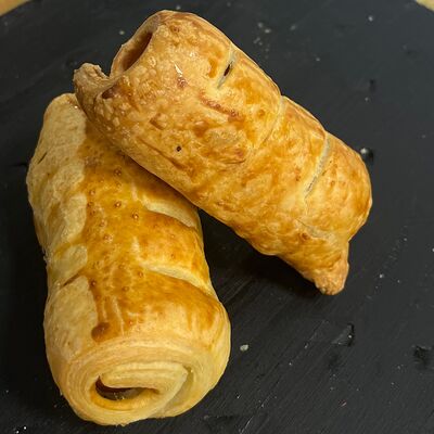 Сосиска в тестев Пончуррос по цене 99 ₽