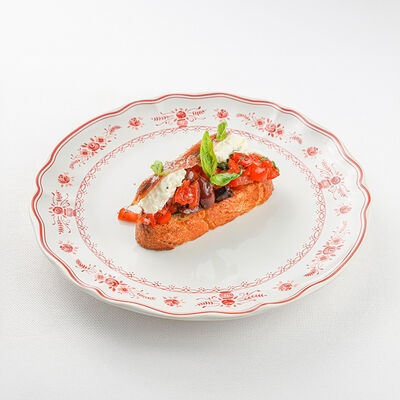 Брускетта Пульезе со страчателлой и анчоусамив La Scala Trattoria Ignazio по цене 18 р.