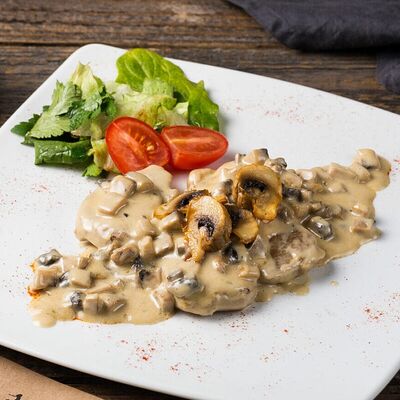 Свинина под грибным соусом в Пепперони по цене 720 ₽