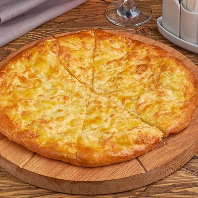 Пирог Осетинский с картофелем в Офицерское по цене 470 ₽