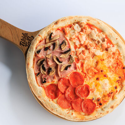 Пицца Четыре сезона 28см в Семейный ресторан Tiki&Taki по цене 750 ₽