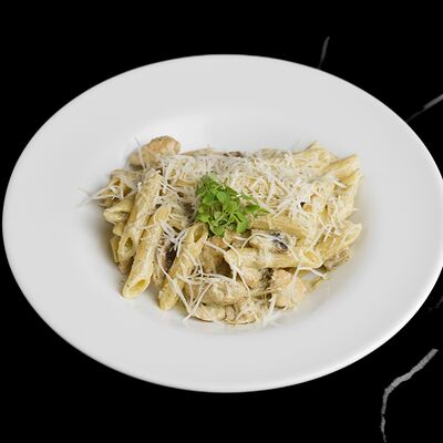 Пенне с курицей и грибами в Nest по цене 550 ₽