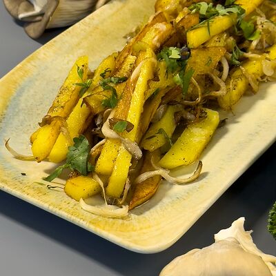 Картофель жареный с луком и грибами в Колхида Palace по цене 590 ₽