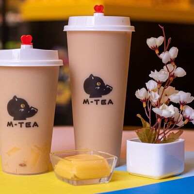 Черный латте с пудингом в Mtea по цене 360 ₽