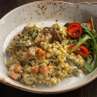 Птитим с морепродуктамив Лепрекон по цене 640 ₽