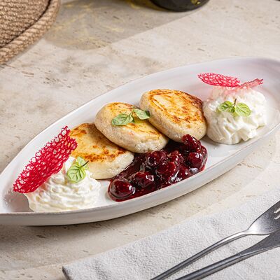 Сырники с ягодным соусом в Abrau Club по цене 890 ₽