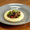 Томленые в винном соусе говяжьи щечки с бархатным картофелем в Il Pizzaiolo по цене 1050