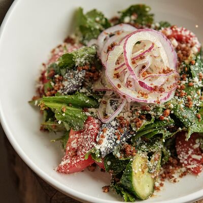 Салат с кавказским песто, чеченской брынзой и кахетинским маслом в Folk по цене 990 ₽