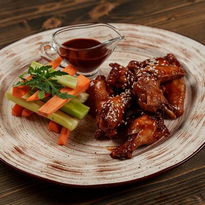 Куриные крылья барбекюв Гастробар Феллини по цене 590 ₽