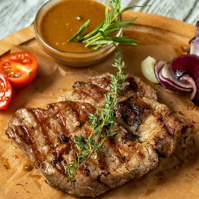 Стейк из свиной шеи в William Bass по цене 1100 ₽