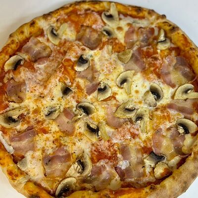 Пицца Бекон-грибы в Печь Мангал по цене 990 ₽