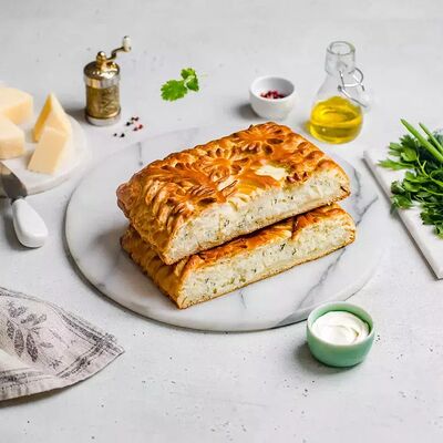 Пирог с сыром Сулугуни в Штолле по цене 3238 ₽