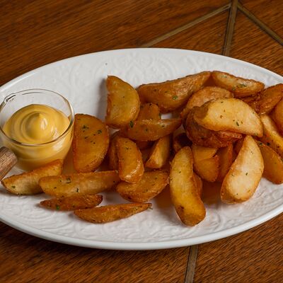 Картофельные дольки в The 312 по цене 380 ₽