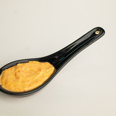 Соус спайси в Ёжкин ролл по цене 100 ₽