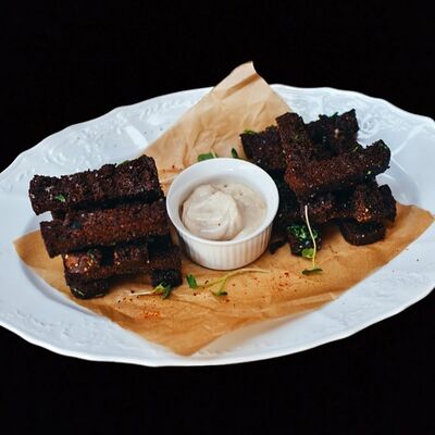 Гренки чесночные в Лаверна по цене 330 ₽