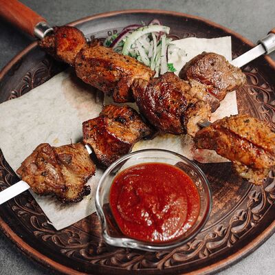 Шашлык из свиной шеи в Приключения Шурика по цене 730 ₽