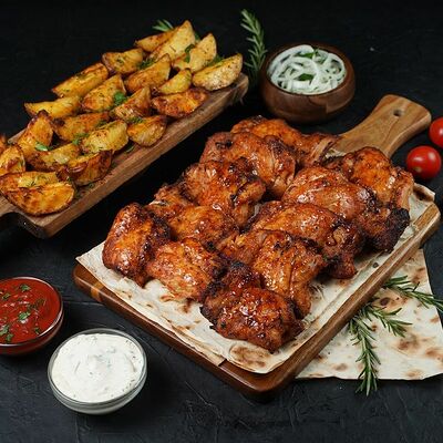 Комбо из куриного филе бедра в Много Мяса по цене 2050 ₽