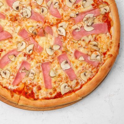 Пицца с ветчиной и грибами в Antonio по цене 720 ₽