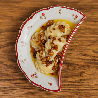 Вареники с творогомв Казак по цене 450 ₽