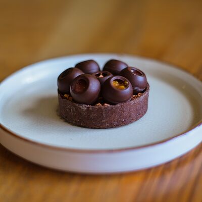 Шоколадный тарт с фундуком в Дюшес по цене 420