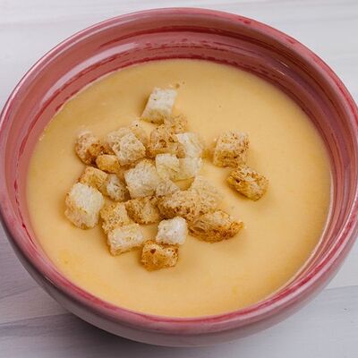 Суп сырный с гренками в Papa Carlo по цене 180 ₽