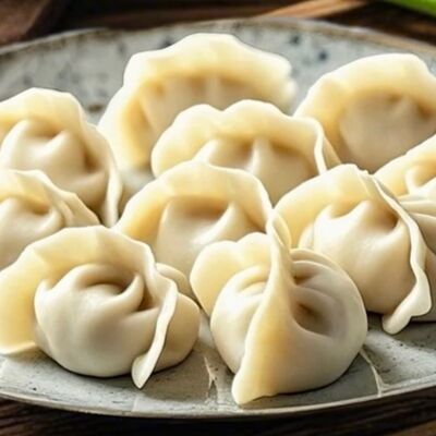 F7 Пельмени со свининой и пекинской капустой в Ван шифу по цене 628 ₽