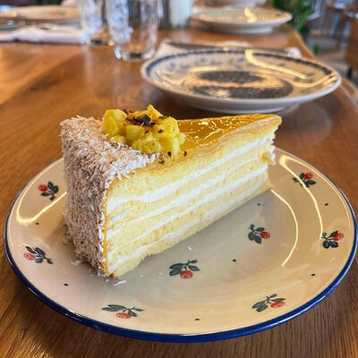 Сметанный торт с манго в Сыроварня по цене 650 ₽