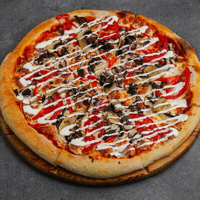 Пицца Говядина и овощи в Гурман по цене 710 ₽