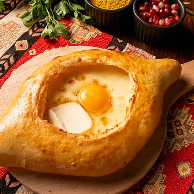 Хачапури по-аджарски в Keto & Kote Грузинская кухня по цене 709 ₽