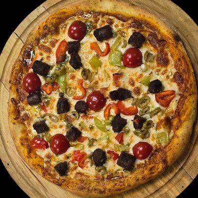 Пицца Мясная в Карфаген по цене 1300 ₽