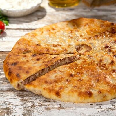 Говядина с картофелем 450 г в Пиросетия Осетинские пироги по цене 510 ₽