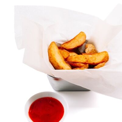 Картофель дольки с кетчупом в Пицца Хаб по цене 352 ₽