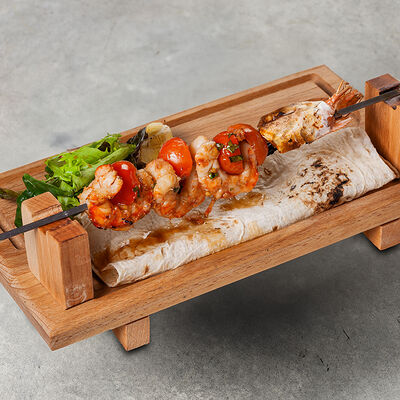 Лангустины на хоспере с помидорами в Станъ по цене 1010 ₽